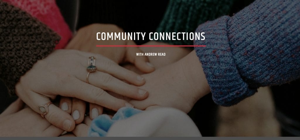 Several people's hands all connecting